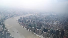 Daytime panning time lapse looking south from Shanghai Tower