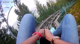 Mountain Rollercoaster into the Woods with Camera On Board going Downhill without Brakes, Superfast Ride