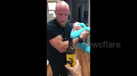 US dad uses his baby to perfect the #BottleCapChallenge