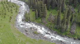 Drone video of Altyn Arashan River, Yurts Village, Karakol, Issyk Kul Lake, Kyrgyzstan, Central Asia.