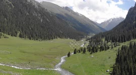 Drone video of Altyn Arashan River, Yurts Village, Karakol, Issyk Kul Lake, Kyrgyzstan, Central Asia.