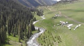 Drone video of Altyn Arashan River, Yurts Village, Karakol, Issyk Kul Lake, Kyrgyzstan, Central Asia.