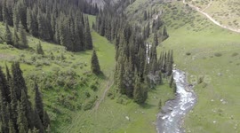 Drone video of Altyn Arashan River, Yurts Village, Karakol, Issyk Kul Lake, Kyrgyzstan, Central Asia.