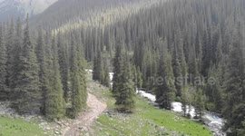 Drone video of Altyn Arashan River, Yurts Village, Karakol, Issyk Kul Lake, Kyrgyzstan, Central Asia.