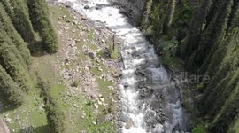 Drone video of Altyn Arashan River, Karakol, Issyk Kul Lake, Kyrgyzstan, Central Asia.