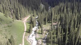 Drone video of Altyn Arashan River, Karakol, Issyk Kul Lake, Kyrgyzstan, Central Asia.