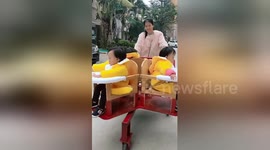 Homemade spinning pushchair designed for triplets spotted in China's Zhuhai