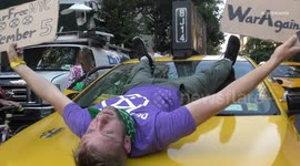 Hundreds of cyclists stage a 'die-in' protest at New York park