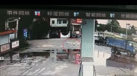 Chinese cyclist escapes serious injury after being run over by truck in China