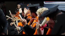 UK university students receive degrees in wacky graduation ceremony on a ROLLERCOASTER