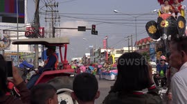 A very colourful rocket festival parade with amazing floats and performances, on the day before the annual rocket festival in North Eastern Thailand.