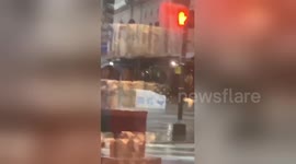 Shocking moment ice machine washed away on flooded New Orleans street