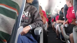 Choir singing on Delta Airlines flight from Salt Lake City to Los Angeles