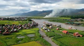 HyperLapse Drone Footage of Boat Traffic and Burning Rice Fields at Inle Lake in Myanmar