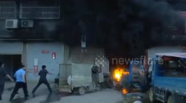 Terrified people jump from first floor window to escape fire in China