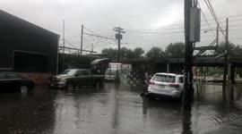 Cars abandoned in floodwater on New Jersey road after tornado rattles area