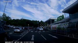 Uber driver opens door into oncoming traffic almost getting hit