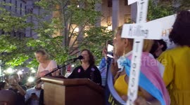 New York: Demonstrators sing at 'Lights for Liberty' vigil