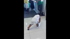 Three-Year-Old Boy Dances In Mall