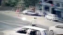 Miraculously survies a man hit by moving car in Northern India.