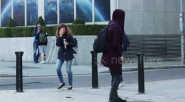 Ireland pedestrians jump and scream as they become victims of giant spider prank