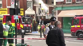 Firefighters battle blaze at shop in central London