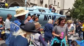 Extinction Rebellion boat blocks road outside Royal Courts of Justice in London