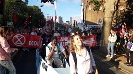 Extinction Rebellion block roads at Waterloo dancing to 'rebel rebel'