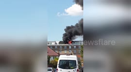 Thick smoke envelops London block of flats in east Acton