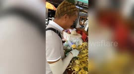 Committed fruit vendor gets pineapple haircut in order to look 'more professional'