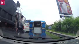 Thief caught on camera leaping over motorway barrier to steal from passengers on moving bus