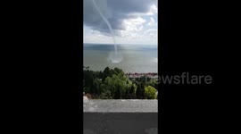 Rare waterspout spotted swirling off Russian coast