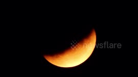 'Half-blood' moon lights up night sky in London