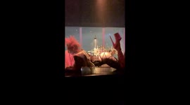 Club kid on the bar at Le Bain in New York City