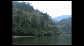 RIVER IN THE AREA OF FOREST MARGA SATWA RIMBA BALING, RIAU, WHICH IS FULFILLED WITH WOOD WITH ILLEGAL LOGING