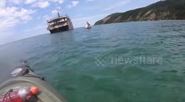 Kayakers explore haunting shipwreck in Lake Michigan