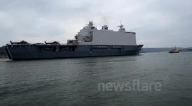 HNLMS Johan de Witt L801 arrives at plymouth naval base today with support from the local mod police on the tamar