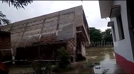 Moment house collapses in India's Bihar as floods death toll 'rises to 78'