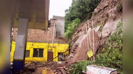 People flee from petrol station in southern China as massive landslide approaches