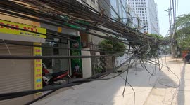 Dangerous and crazy power lines in Vietnam! it is like a spider web and lies in the middle of the road