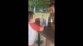 Toddler gets into hilarious heated discussion with his dad - but what is he saying?
