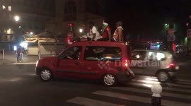 Algeria fans celebrate Africa cup win in Paris on top of the car