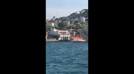 A yacht in flames on the Bosphorus in Istanbul, Turkey