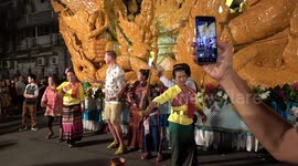 Tourists And Locals Dance At Buddhist Festival