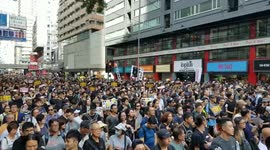 Hong Kong pro-democracy protesters march through Wanchai