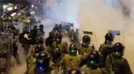 Hong Kong police fire tear gas then charge at protesters