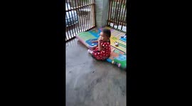 Baby girl fell  down when eating
