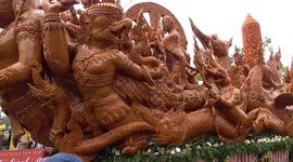 Beautiful giant wax sculptures mark Buddhist Lent in Thailand