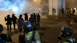 Chaotic scenes in Hong Kong as riot police fire tear gas at protesters