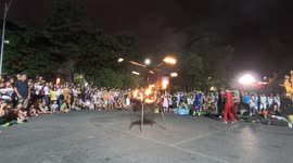 Woman dancing fire with legs and hands in Vietnam